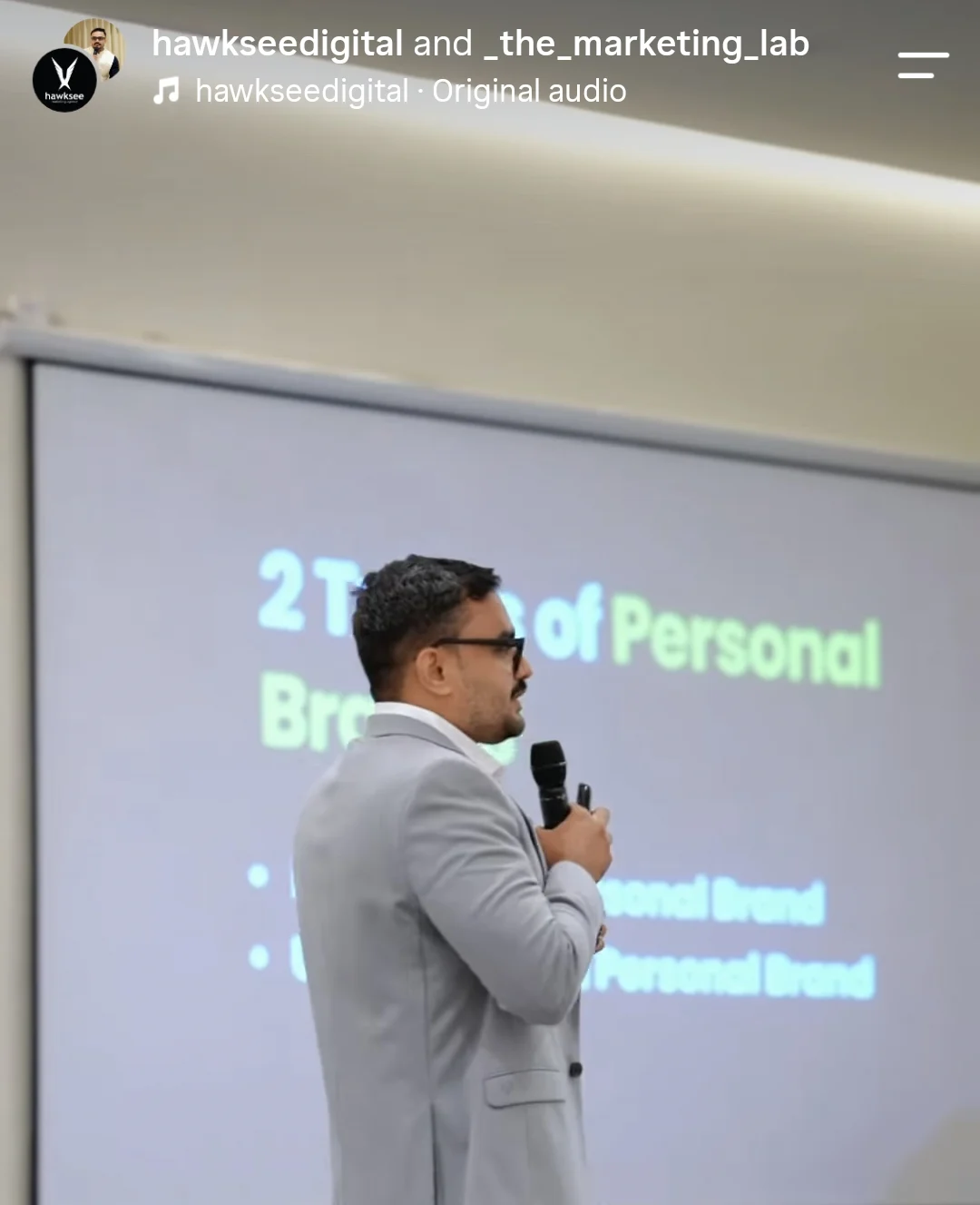 Ahmed Ashraf presenting the '2 types of personal brand' slide